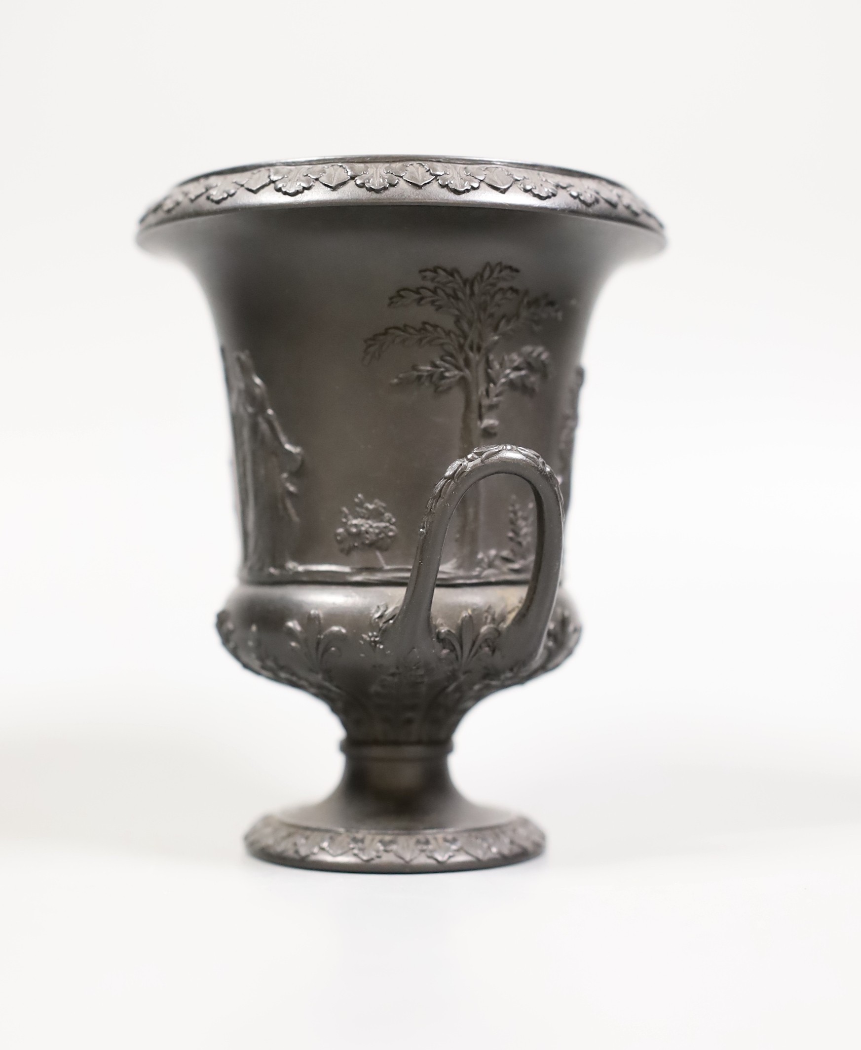 A Wedgwood black basalt urn vase, 13cm tall